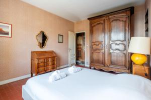 Ein Bett oder Betten in einem Zimmer der Unterkunft Les Aiguadines par Dodo à Cassis