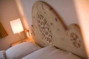 Letto o letti in una camera di Hotel Seraina