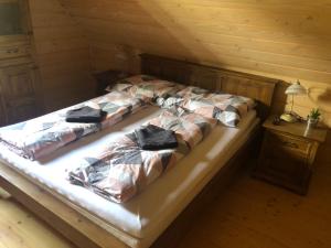 Postel nebo postele na pokoji v ubytování Chalúpka pri Mare