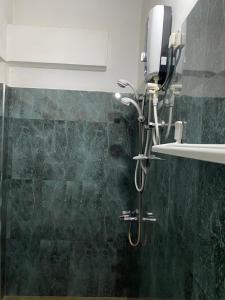 Ein Badezimmer in der Unterkunft Why Not Palace
