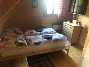 Postel nebo postele na pokoji v ubytování Chalúpka pri Mare