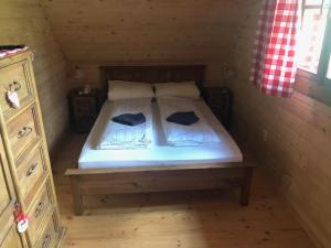 Postel nebo postele na pokoji v ubytování Chalúpka pri Mare