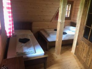 Postel nebo postele na pokoji v ubytování Chalúpka pri Mare