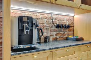 Una cocina o zona de cocina en Sopot Pod Orłem Monte Cassino by Downtown Apartments 21 fotos más