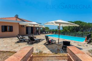 The swimming pool at or close to Alghero Villa Barranch with sea view swimming pool for 6 people