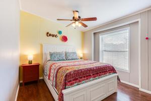a bedroom with a bed and a ceiling fan at La Verkin Home with Yard, Covered Patio and Grill in La Verkin
