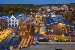 Φωτογραφία από το άλμπουμ του Spacious luxury apt w/river view/terrace Paupys στο Βίλνιους