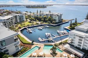 an aerial view of a marina with boats in it at Allisee Apartments in Gold Coast