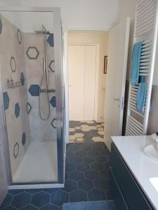 a bathroom with a shower and a sink at Casa Tina in Verbania