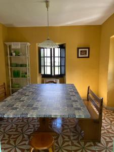 a dining room with a large table in a room at Casa BellaTerra in Villasana de Mena