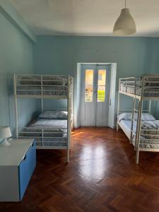 Łóżko lub łóżka w pokoju w obiekcie Casa BellaTerra