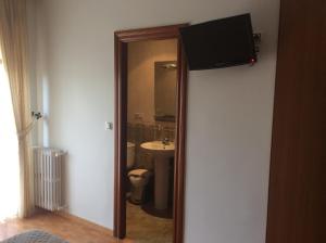 Koupelna v ubytování Hostal Juli