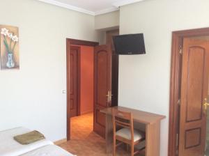 TV a/nebo společenská místnost v ubytování Hostal Juli