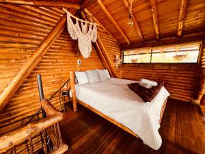 Postel nebo postele na pokoji v ubytování Skyline Ecoliving Santa Elena