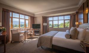 A bed or beds in a room at The Brehon Hotel & Spa