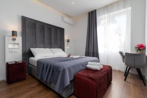 Antares Luxury Rooms 2客房内的一张或多张床位