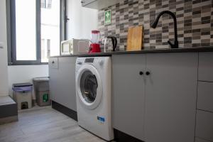 Kuchyň nebo kuchyňský kout v ubytování Casa Amarela - Conforto e localização central!