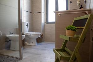 Koupelna v ubytování Casa Amarela - Conforto e localização central! + 37 fotografií