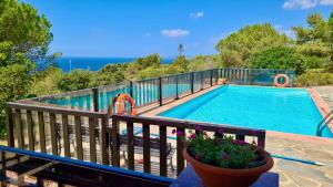 The swimming pool at or close to Alghero Villa Barranch with sea view swimming pool for 6 people