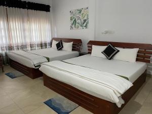 Ein Bett oder Betten in einem Zimmer der Unterkunft Why Not Palace
