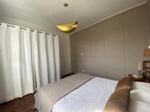 Postel nebo postele na pokoji v ubytování Le 7
