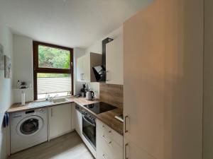Kuchyň nebo kuchyňský kout v ubytování Apartment Gerberbachviertel