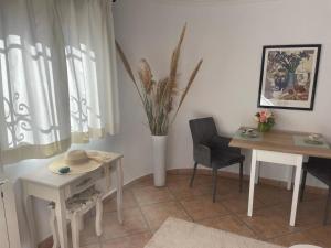 Posezení v ubytování Apartment - 2 Bedrooms - Kitchen - Shared Pool - View