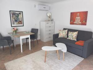 Posezení v ubytování Apartment - 2 Bedrooms - Kitchen - Shared Pool - View