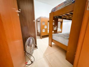 En eller flere senge i et værelse på Apartamento Aconchego beach + 42 billeder