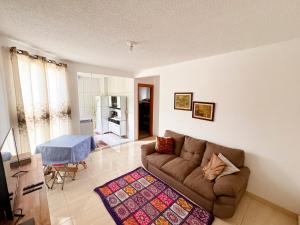 Et opholdsområde på Apartamento Aconchego beach