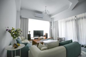 TV a/nebo společenská místnost v ubytování Love米渡假會館