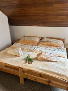 Postel nebo postele na pokoji v ubytování Apartmány u Pilota