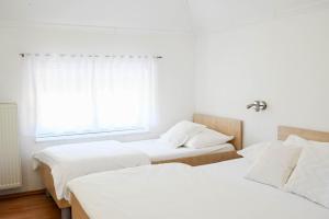 Ένα ή περισσότερα κρεβάτια σε δωμάτιο στο Guesthouse Rubcic
