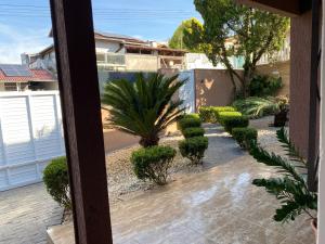 a view of a garden from a balcony at Pousada Paisagem in Jaraguá do Sul