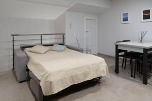 Postel nebo postele na pokoji v ubytování Le case di vada - Il Faro