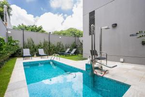 a swimming pool in the backyard of a house at 360 My Moema in São Paulo