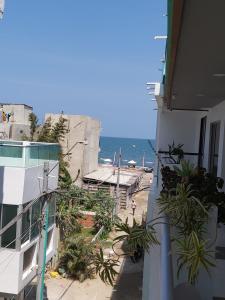 an apartment building with a view of the ocean at Dreimar Hotel Boutique in Cartagena de Indias