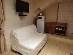 Ένα ή περισσότερα κρεβάτια σε δωμάτιο στο Gite A.M Hoche