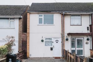 a white house with a white door at No.10 Bristol in Bristol