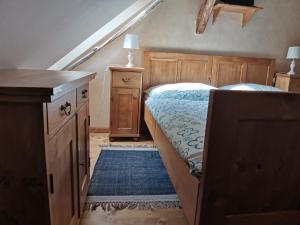 Posteľ alebo postele v izbe v ubytovaní Apartmány U Koudelníka