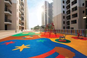 a playground in the middle of a city at Homestay-a better living in Lucknow