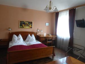 Postel nebo postele na pokoji v ubytování Hotel Apartment Rothensteiner