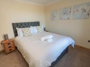 Postel nebo postele na pokoji v ubytování Nook Cottage + 30 fotografií