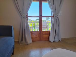 Fotografie z fotogalerie ubytování natura studios superior almyros v destinaci Almiros Beach