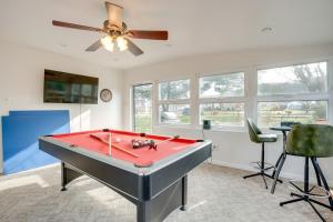 a pool table in a living room with a ceiling fan at Coopersburg Vacation Rental with Outdoor Oasis! in Coopersburg