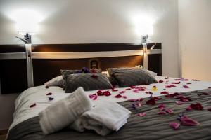 Voodi või voodid majutusasutuse HOSTAL LAS PALOMAS toas