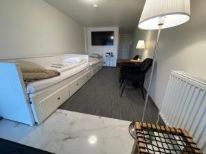 Voodi või voodid majutusasutuse Vid Gekås Ullared Boende B&B toas