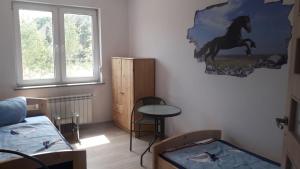 Katil atau katil-katil dalam bilik di Moderne Unterkunft für Monteure nahe Berlin
