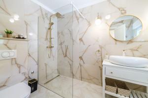 a bathroom with a shower and a sink and a mirror at House Josipa in Supetar +34 photos