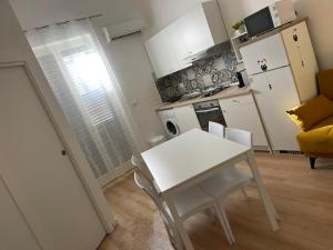 Kuchyň nebo kuchyňský kout v ubytování Mazzini House